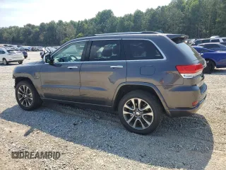 2018 Jeep Grand Cherokee High Altitude with VIN 1C4RJECG8JC239080, listed as a Copart auction lot 62141205 with 66,126 mi miles and Salvage title. Bid and sale history available at DreamBid. Image 2.