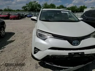 2016 Toyota RAV4 Limited z VIN JTMDJREVXGD054156, wystawiony jako Copart lot #56239415 z przebiegiem 127 849 mil mil oraz Szkoda całkowita • Salvage title. Historia ofert i sprzedaży dostępna na DreamBid. Obrazek 14.