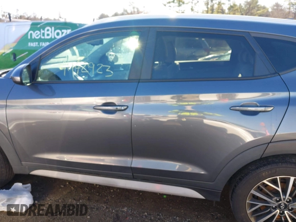 2019 Hyundai Tucson Ultimate with VIN KM8J3CAL9KU004559, listed as a IAAI auction lot 41142923 with 95,396 mi miles. Bid and sale history available at carsss.com. Image 14.