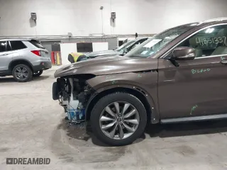 2019 Infiniti QX50 LUXE with VIN 3PCAJ5M36KF134096, listed as a IAAI auction lot 41851337 with 77,647 mi miles. Bid and sale history available at carsss.com. Image 17.