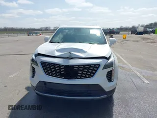 2020 Cadillac XT4 AWD Premium Luxury z VIN 1GYFZDR44LF036461, wystawiony jako IAAI lot #41934371 z przebiegiem 90 545 mil mil oraz . Historia ofert i sprzedaży dostępna na DreamBid. Obrazek 12.