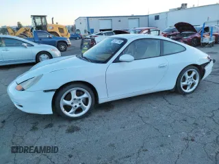 1999 Porsche 911 z VIN WP0AA2991XS621034, wystawiony jako Copart lot #82927194 z przebiegiem 131 459 mil mil oraz Szkoda całkowita • Salvage title. Historia ofert i sprzedaży dostępna na DreamBid. Obrazek 1.