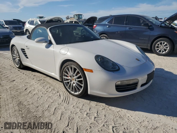 2007 Porsche Boxster S z VIN WP0CB29837U730970, wystawiony jako Copart lot #77829184 z przebiegiem Nie podano mil oraz Szkoda całkowita • Salvage title. Historia ofert i sprzedaży dostępna na DreamBid. Obrazek 4.