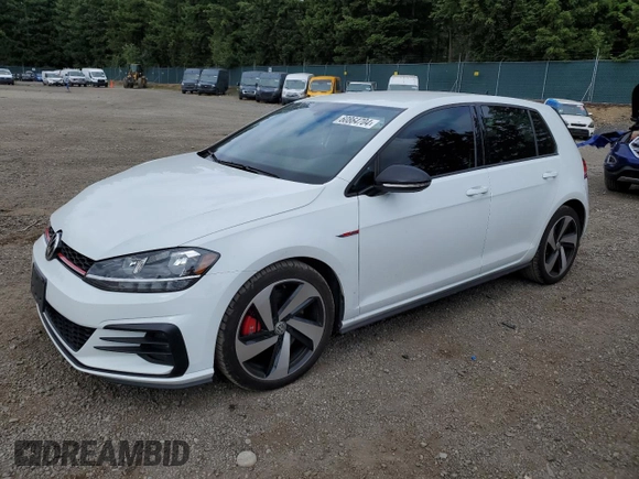 2021 Volkswagen Golf GTI S with VIN 3VW6T7AU5MM009756, listed as a Copart auction lot 60864704 with 39,379 mi miles and Salvage Title. Bid and sale history available at carsss.com. Image 1.