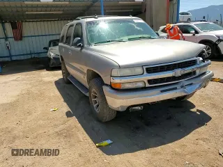 2003 Chevrolet Tahoe LT with VIN 1GNEC13ZX3R111532, listed as a Copart auction lot 63007715 with 259,010 mi miles and Salvage title. Bid and sale history available at DreamBid. Image 13.