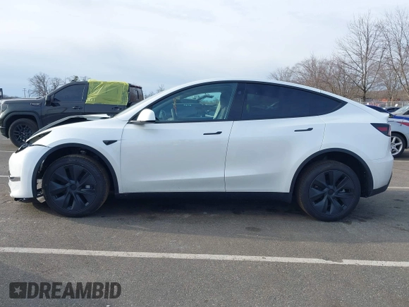 2025 Tesla Model Y Long Range with VIN 7SAYGDEE1SA343429, listed as a IAAI auction lot 41504455 with 1,284 mi miles and . Bid and sale history available at carsss.com. Image 14.
