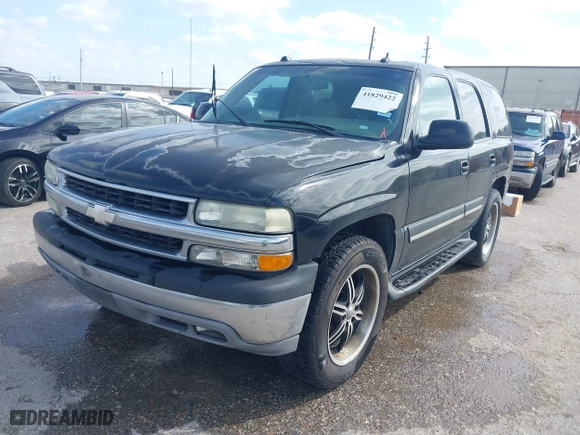 2004 Chevrolet Tahoe LT with VIN 1GNEC13Z74J323109, listed as a IAAI auction lot 41829422 with 261,636 mi miles. Bid and sale history available at carsss.com. Image 2.