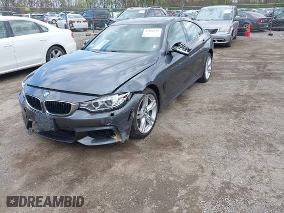 2015 BMW 4 Series 428i xDrive z VIN WBA4A7C5XFD415131, wystawiony jako IAAI lot #42100618 z przebiegiem 89 093 mil mil oraz . Historia ofert i sprzedaży dostępna na DreamBid. Obrazek 2.