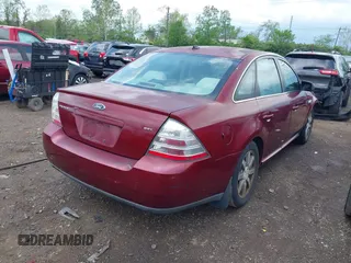 2008 Ford Taurus SEL with VIN 1FAHP24W88G149063, listed as a IAAI auction lot 42168947 with 128,735 mi miles and . Bid and sale history available at DreamBid. Image 4.