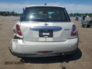 2011 MINI Hardtop with VIN WMWSU3C5XBTX96048, listed as a Copart auction lot 57607955 with 99,632 mi miles and Salvage title. Bid and sale history available at DreamBid. Image 6.