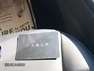 2023 Tesla Model 3 with VIN 5YJ3E1EA9PF585632, listed as a IAAI auction lot 40520993 with 7,775 mi miles and . Bid and sale history available at DreamBid. Image 11.