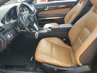 2012 Mercedes-Benz E 350 with VIN WDDKK5KF4CF148130, listed as a Copart auction lot 60140815 with 86,895 mi miles and Salvage title. Bid and sale history available at DreamBid. Image 7.