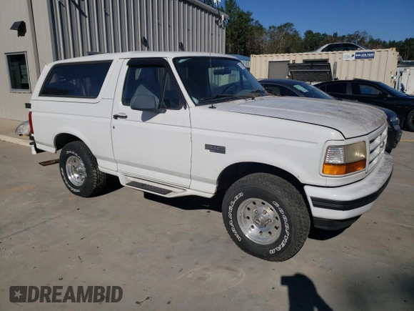 1996 Ford Bronco XL с VIN 1FMEU15N4TLB67027, выставлен на аукционе Copart как лот 75346314 с пробегом 185 224 миль миль и Списание • Salvage title. История ставок и продаж доступна на DreamBid. Изображение 4.