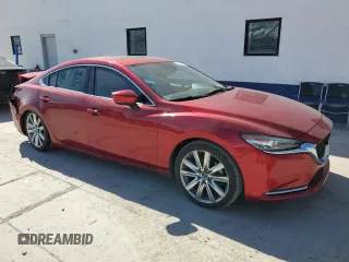 2021 Mazda 6 Carbon Edition with VIN JM1GL1WY8M1605828, listed as a Copart auction lot 48435225 with 70,917 mi miles and Salvage Title. Bid and sale history available at DreamBid. Image 4.