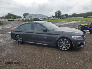 2020 BMW 5 Series M550i xDrive with VIN WBAJS7C06LCD12779, listed as a Copart auction lot 61136215 with 81,286 mi miles and Salvage title. Bid and sale history available at DreamBid. Image 4.