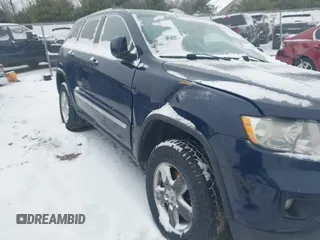 2013 Jeep Grand Cherokee Laredo with VIN 1C4RJFAGXDC542987, listed as a IAAI auction lot 41262770 with 199,273 mi miles. Bid and sale history available at carsss.com. Image 16.