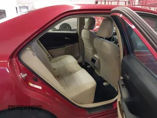 2012 Toyota Camry L z VIN 4T4BF1FKXCR235736, wystawiony jako IAAI lot #41199529 z przebiegiem 106 069 mil mil oraz . Historia ofert i sprzedaży dostępna na DreamBid. Obrazek 8.