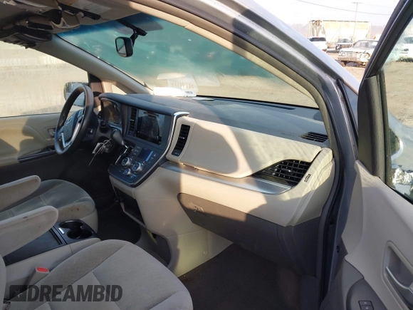 2017 Toyota Sienna LE with VIN 5TDJZ3DC6HS184126, listed as a IAAI auction lot 41166135 with 101,305 mi miles. Bid and sale history available at carsss.com. Image 5.