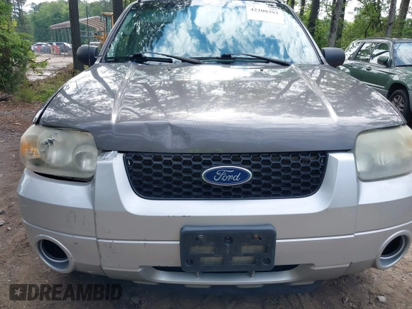2005 Ford Escape Hybrid with VIN 1FMCU95H45KD91052, listed as a IAAI auction lot 42200393 with 304,817 mi miles and . Bid and sale history available at DreamBid. Image 12.