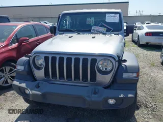 2021 Jeep Wrangler Unlimited Sport Altitude with VIN 1C4HJXDGXMW662493, listed as a IAAI auction lot 41288957 with 64,808 mi miles and . Bid and sale history available at DreamBid. Image 13.
