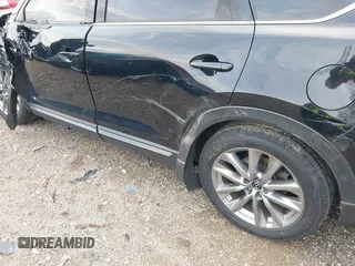 2020 Mazda CX-9 Grand Touring with VIN JM3TCBDY3L0419049, listed as a IAAI auction lot 41948393 with 70,163 mi miles and . Bid and sale history available at DreamBid. Image 18.