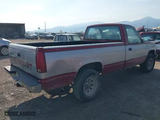 1992 Chevrolet C/K 1500 with VIN 1GCEK14K7NE106585, listed as a IAAI auction lot 40571156 with 148,563 mi miles. Bid and sale history available at carsss.com. Image 4.