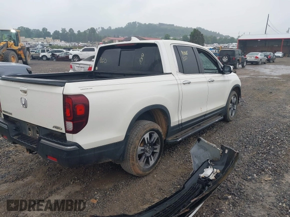 2018 Honda Ridgeline RTL-E with VIN 5FPYK3F77JB017293, listed as a IAAI auction lot 42422614 with 87,700 mi miles and . Bid and sale history available at DreamBid. Image 4.