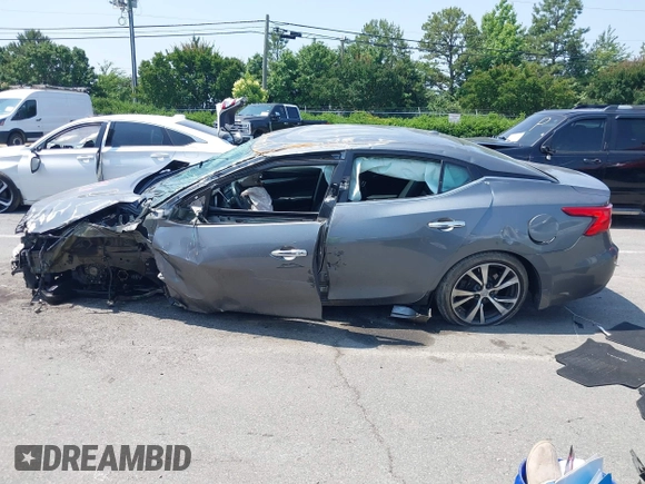 2017 Nissan Maxima S with VIN 1N4AA6AP3HC416012, listed as a IAAI auction lot 42390026 with 105,921 mi miles and . Bid and sale history available at DreamBid. Image 14.