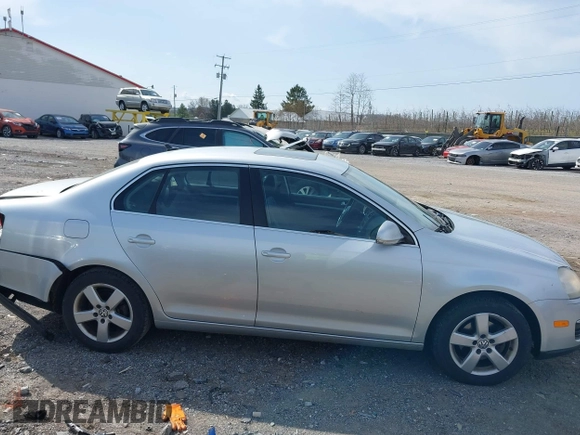 2009 Volkswagen Jetta Sedan SE with VIN 3VWRM71K59M131257, listed as a IAAI auction lot 41921694 with 190,389 mi miles. Bid and sale history available at carsss.com. Image 13.