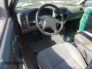 1995 Nissan Frontier XE z VIN 1N6HD16S6SC450675, wystawiony jako Copart lot #88047365 z przebiegiem 193 820 mil mil oraz Czysty tytuł • Clean title. Historia ofert i sprzedaży dostępna na DreamBid. Obrazek 8.