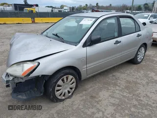 2006 Mitsubishi Lancer ES with VIN JA3AJ26E36U043781, listed as a IAAI auction lot 41778580 with 166,141 mi miles. Bid and sale history available at carsss.com. Image 2.