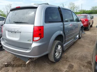 2016 Dodge Grand Caravan SXT with VIN 2C4RDGCG7GR275832, listed as a IAAI auction lot 42113811 with 131,851 mi miles and . Bid and sale history available at DreamBid. Image 4.