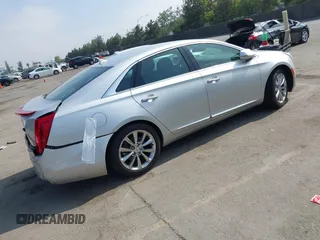 2014 Cadillac XTS Luxury with VIN 2G61N5S30E9294994, listed as a IAAI auction lot 42617654 with 159,573 mi miles and . Bid and sale history available at DreamBid. Image 4.