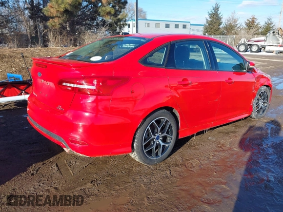 2015 Ford Focus SE with VIN 1FADP3F24FL367357, listed as a IAAI auction lot 41638693 with 107,379 mi miles. Bid and sale history available at carsss.com. Image 4.
