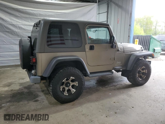 2005 Jeep Wrangler Sport z VIN 1J4FA49S75P325028, wystawiony jako Copart lot #56942315 z przebiegiem 169 988 mil mil oraz Szkoda całkowita • Salvage title. Historia ofert i sprzedaży dostępna na DreamBid. Obrazek 3.