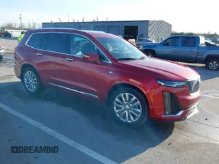 2021 Cadillac XT6 Premium Luxury with VIN 1GYKPDRS5MZ233349, listed as a IAAI auction lot 41818937 with 44,344 mi miles. Bid and sale history available at carsss.com. Image 1.