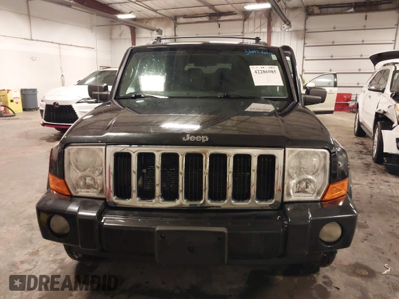 2010 Jeep Commander Sport z VIN 1J4RG4GT4AC115611, wystawiony jako IAAI lot #42286985 z przebiegiem 149 365 mil mil oraz . Historia ofert i sprzedaży dostępna na DreamBid. Obrazek 12.