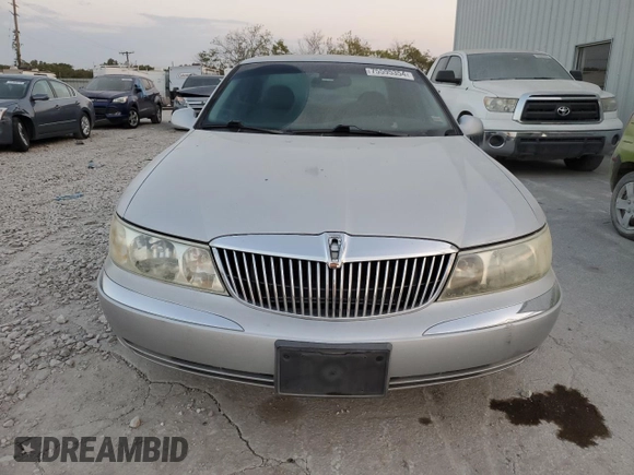 2002 Lincoln Continental with VIN 1LNHM97VX2Y672516, listed as a Copart auction lot 75595354 with 154,361 mi miles and Salvage Title. Bid and sale history available at carsss.com. Image 5.