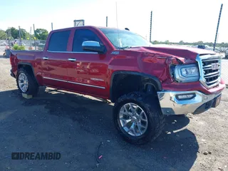 2018 GMC Sierra 1500 SLT z VIN 3GTU2NEC5JG358977, wystawiony jako IAAI lot #42307905 z przebiegiem 132 690 mil mil oraz . Historia ofert i sprzedaży dostępna na DreamBid. Obrazek 1.