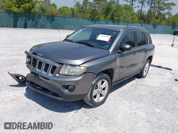 2012 Jeep Compass Sport with VIN 1C4NJCBB9CD610317, listed as a IAAI auction lot 42049138 with 127,616 mi miles and . Bid and sale history available at carsss.com. Image 2.