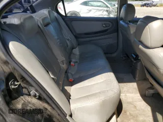 2000 Nissan Maxima GXE z VIN JN1CA31D6YT762114, wystawiony jako Copart lot #57908775 z przebiegiem 207 805 mil mil oraz Szkody całkowita. Historia ofert i sprzedaży dostępna na DreamBid. Obrazek 10.