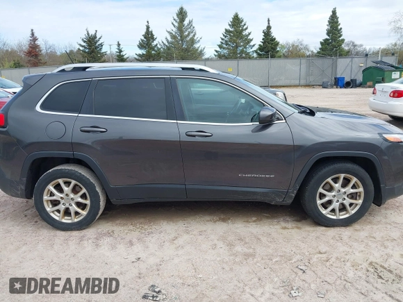 2015 Jeep Cherokee Latitude with VIN 1C4PJLCS9FW542181, listed as a IAAI auction lot 42183167 with 144,607 mi miles and . Bid and sale history available at carsss.com. Image 13.