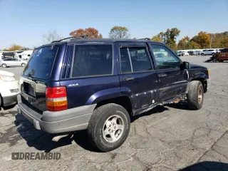 1998 Jeep Grand Cherokee Laredo with VIN 1J4GZ58S8WC167716, listed as a Copart auction lot 76477694 with 167,519 mi miles and Salvage Title. Bid and sale history available at carsss.com. Image 3.
