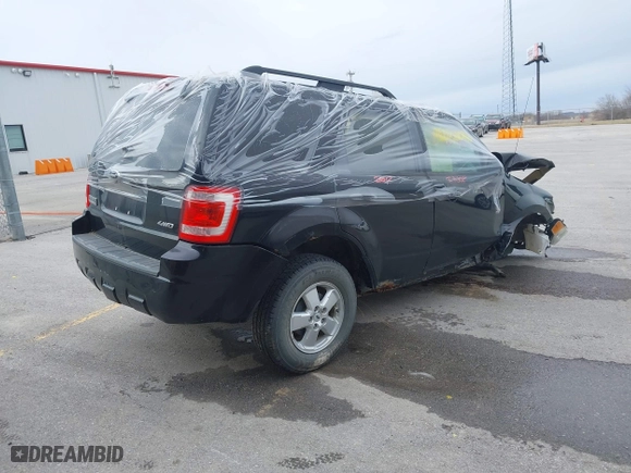 2009 Ford Escape XLT with VIN 1FMCU93GX9KD11544, listed as a IAAI auction lot 41668099 with 1 mi miles. Bid and sale history available at carsss.com. Image 4.