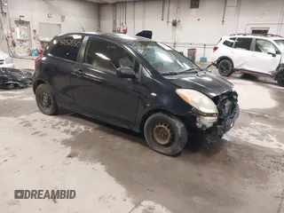 2008 Toyota Yaris with VIN JTDJT923285196299, listed as a IAAI auction lot 42152850 with 214,238 mi miles. Bid and sale history available at carsss.com. Image 1.