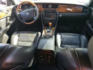 2005 Jaguar XJ VDP with VIN SAJWA82C65SG42753, listed as a Copart auction lot 73792534 with 141,936 mi miles and Salvage Title. Bid and sale history available at carsss.com. Image 8.