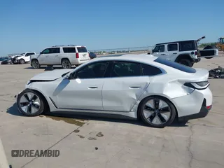 2024 BMW i4 eDrive35 z VIN WBY43AW04RFT05953, wystawiony jako IAAI lot #41972073 z przebiegiem 3333 mil mil oraz . Historia ofert i sprzedaży dostępna na DreamBid. Obrazek 14.