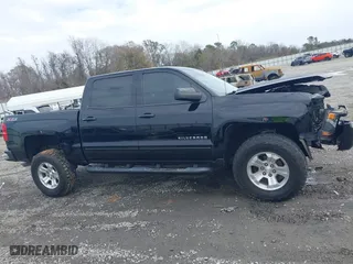 2017 Chevrolet Silverado 1500 LT with VIN 3GCUKREC9HG374973, listed as a IAAI auction lot 41423560 with 141,661 mi miles. Bid and sale history available at carsss.com. Image 13.