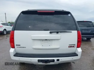 2009 GMC Yukon SLT w/4SA with VIN 1GKFK33049R153415, listed as a IAAI auction lot 41896770 with 182,256 mi miles. Bid and sale history available at carsss.com. Image 16.
