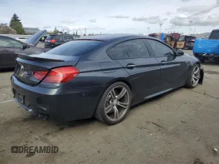 2014 BMW M6 z VIN WBS6C9C56ED467395, wystawiony jako Copart lot #45427405 z przebiegiem 91 506 mil mil oraz Szkoda całkowita • Salvage title. Historia ofert i sprzedaży dostępna na DreamBid. Obrazek 3.